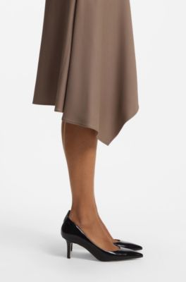 Heeled pumps in leather with debossed logo, Black