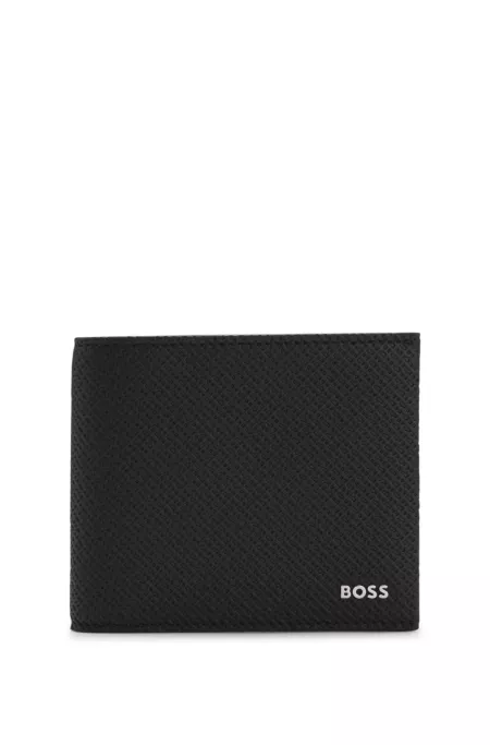 Monogrammed wallet with polished metal logo