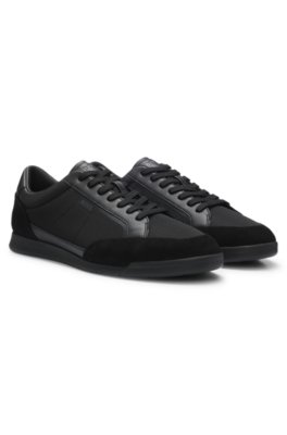 Mixed-material trainers with stitched detailing