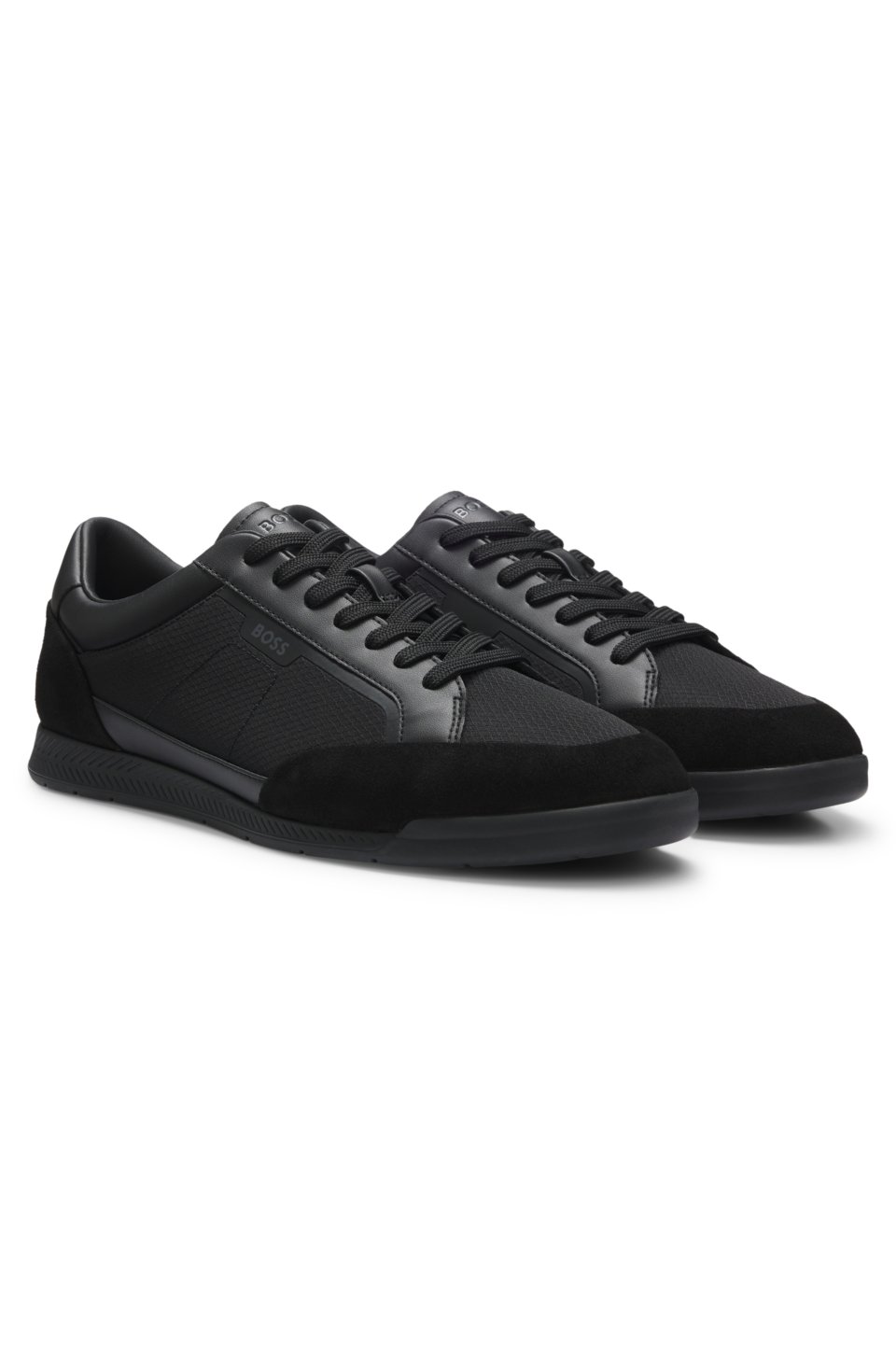 Mixed-material trainers with stitched detailing