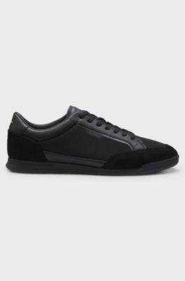 Sneakers van gemengde materialen met gestikte details, Zwart