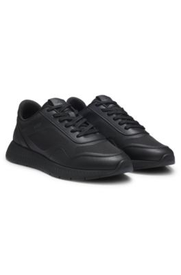 Mixed-material trainers with ridged outsole, Black