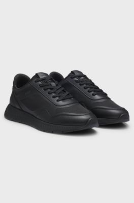 Mixed-material trainers with ridged outsole, Black