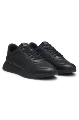 Mixed-material trainers with ridged outsole