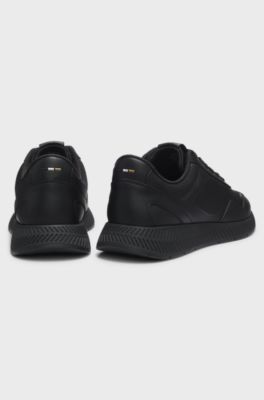Mixed-material trainers with ridged outsole, Black