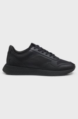 Mixed-material trainers with ridged outsole, Black