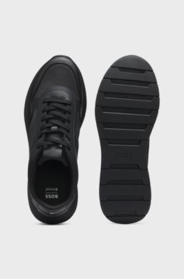 Mixed-material trainers with ridged outsole, Black