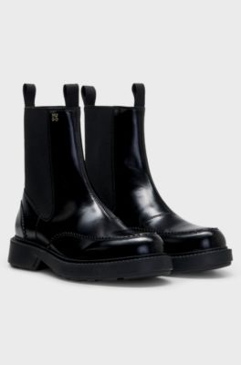 Stacked-logo Chelsea boots in polished leather, Black