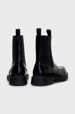 Stacked-logo Chelsea boots in polished leather, Black