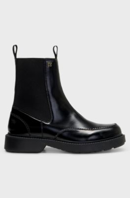Stacked-logo Chelsea boots in polished leather, Black