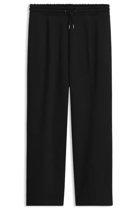 Relaxed-fit tracksuit bottoms in cotton terry