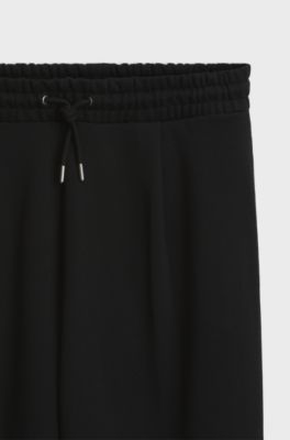 Relaxed-fit tracksuit bottoms in cotton terry, Black