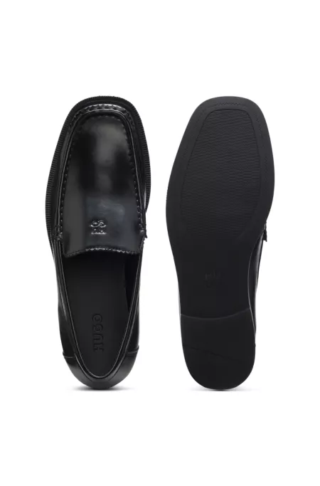 Leather moccasins with stacked logo
