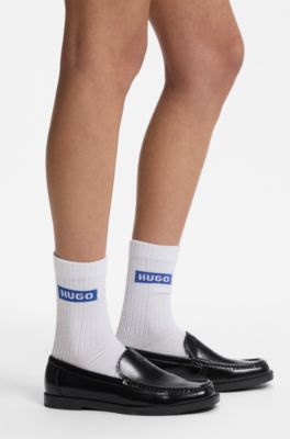 Leather moccasins with stacked logo, Black