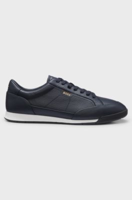 Sneakers i strukturerat l&auml;der med fiskbensm&ouml;nstrad sula, M&ouml;rkbl&aring;