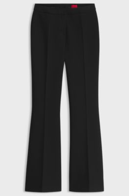Mid-rise flared-fit trousers with ironed creases, Black