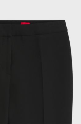 Mid-rise flared-fit trousers with ironed creases, Black
