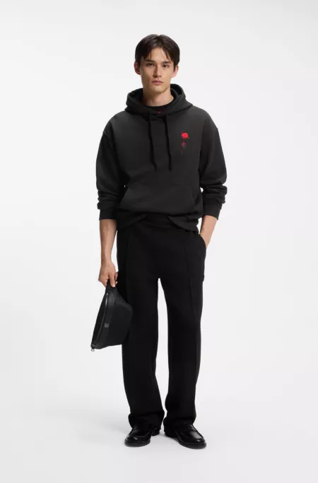 Relaxed-fit hoodie in cotton terry with rose logo