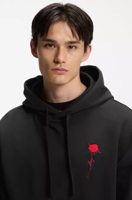 Relaxed-fit hoodie in cotton terry with rose logo