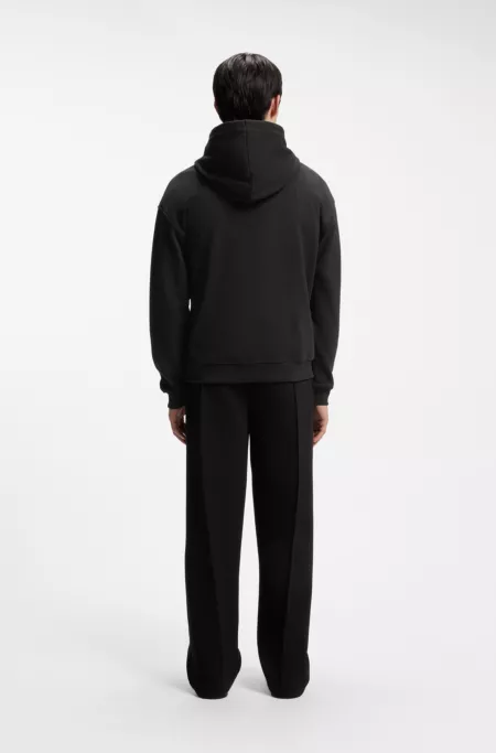 Relaxed-fit hoodie in cotton terry with rose logo