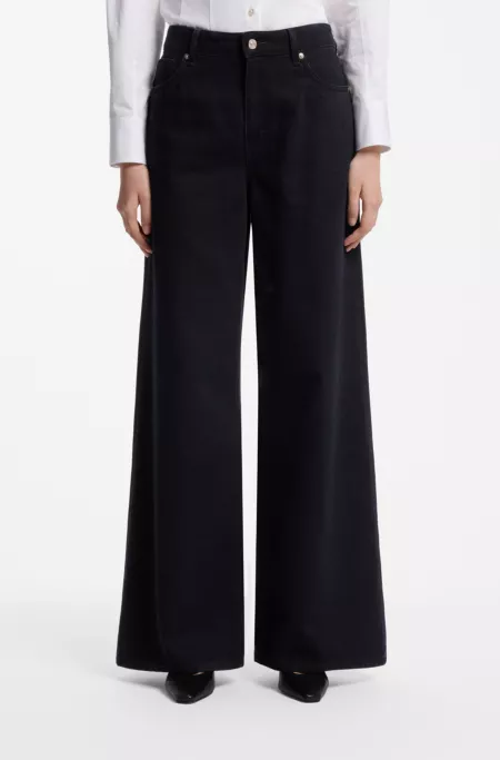 Jeans aus blau-schwarzem Baumwoll-Mix-Denim mit weitem Beinverlauf