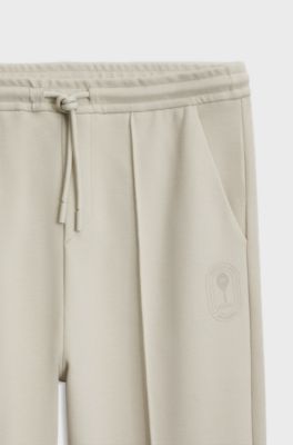 BOSS x AO piqu&eacute; tracksuit bottoms, Light Beige
