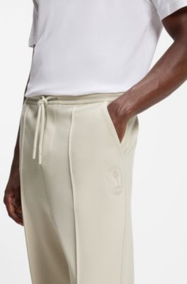 BOSS x AO piqu&eacute; tracksuit bottoms, Light Beige