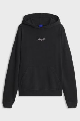 Relaxed-fit hoodie in washed cotton with appliqu&eacute; logo, Black