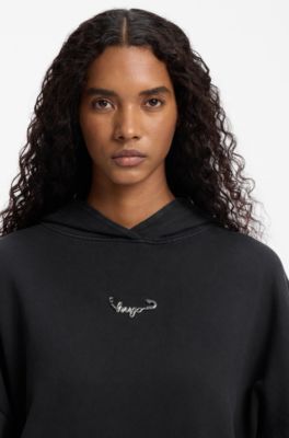 Relaxed-fit hoodie in washed cotton with appliqu&eacute; logo, Black
