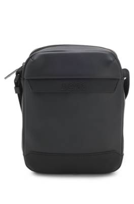 Reporter bag in faux leather with piqué detailing