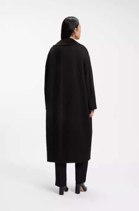 Cocoon-shaped coat in textured fabric