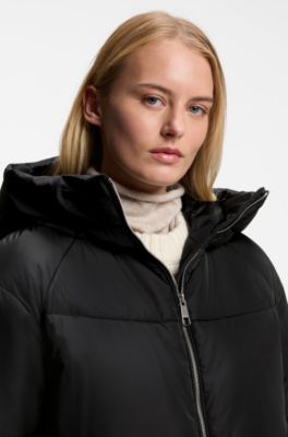 Jacka med huva i vattenavvisande material med vaddering, Svart