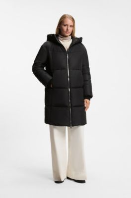 Jacka med huva i vattenavvisande material med vaddering, Svart