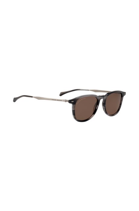 Beta-titanium sunglasses with Havana-effect frames, Patterned