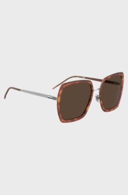 Angular sunglasses with Havana frames and signature hardware, Brown Patterned