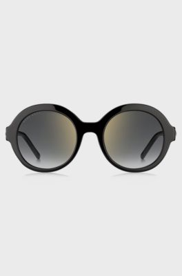 Round sunglasses in black acetate with signature hardware, Black