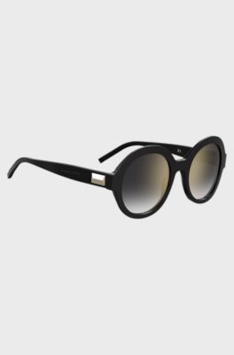 Round sunglasses in black acetate with signature hardware, Black