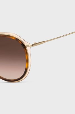 Round sunglasses in Havana acetate with nude sheath, Brown Patterned