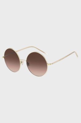 Round sunglasses in gold-tone titanium, Gold