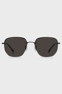 Half-rim sunglasses in black titanium and metal, Black