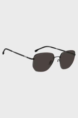 Half-rim sunglasses in black titanium and metal, Black