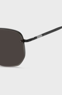 Half-rim sunglasses in black titanium and metal, Black
