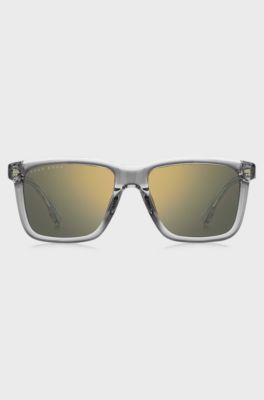 Clear-acetate sunglasses with gold-tone accents, Transparent
