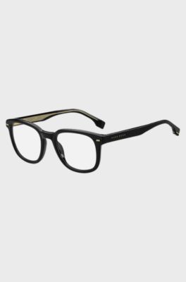 Black-acetate optical frames with gold-tone accents, Black