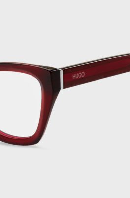 Red-acetate optical frames with temple logos, Red