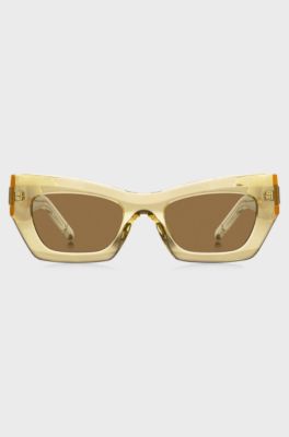 Lunettes de soleil en ac&eacute;tate transparent avec garnitures en m&eacute;tal embl&eacute;matiques, Transparent