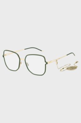 Groen optisch montuur met cut-out poten en schakelketting met merkaccent, Groen