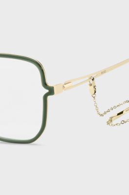Green optical frames with forked temples and branded chain, Green