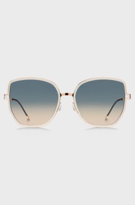 Gold-tone sunglasses with forked temples and branded chain, Light Beige