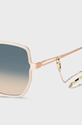 Gold-tone sunglasses with forked temples and branded chain, Light Beige